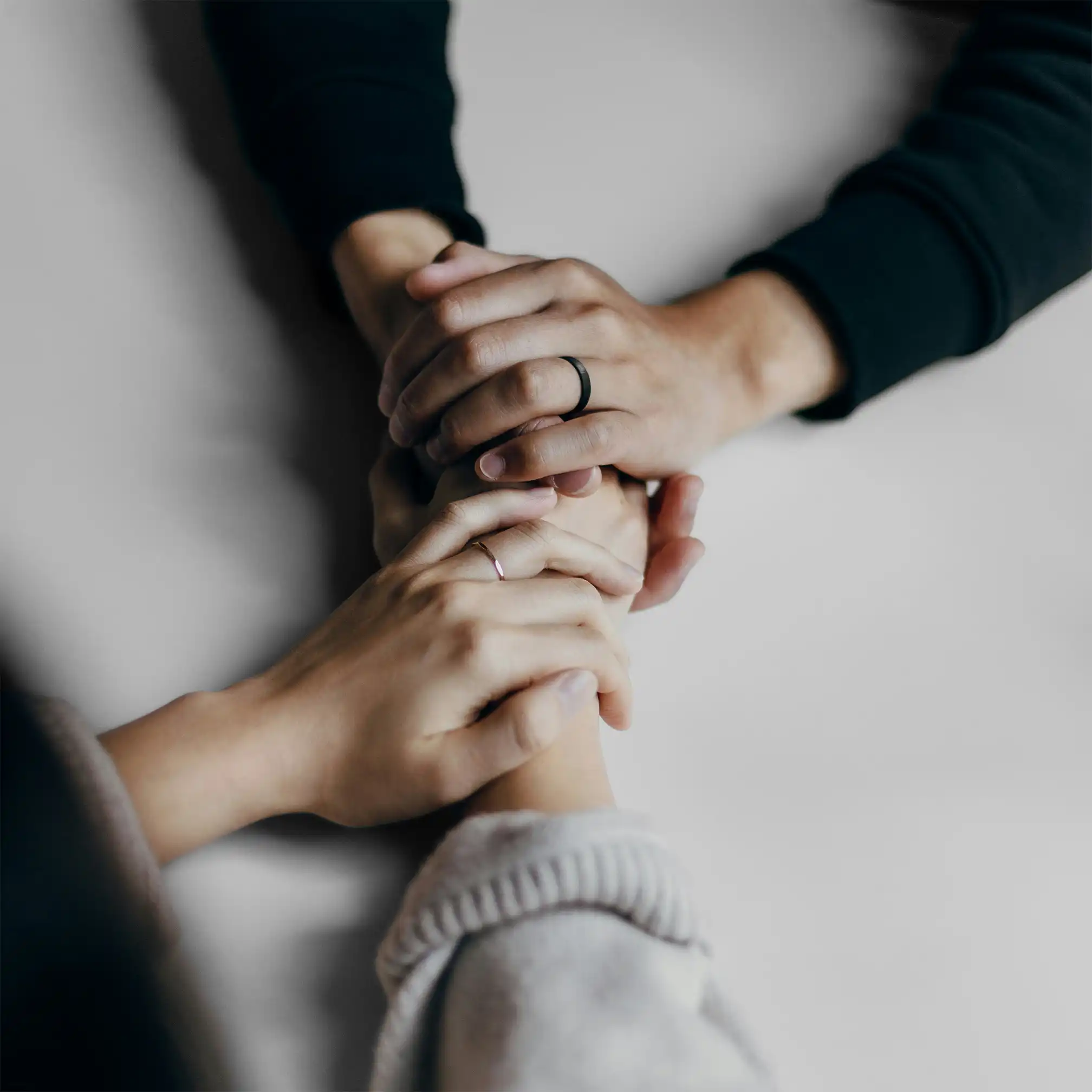 Holding hands to comfort